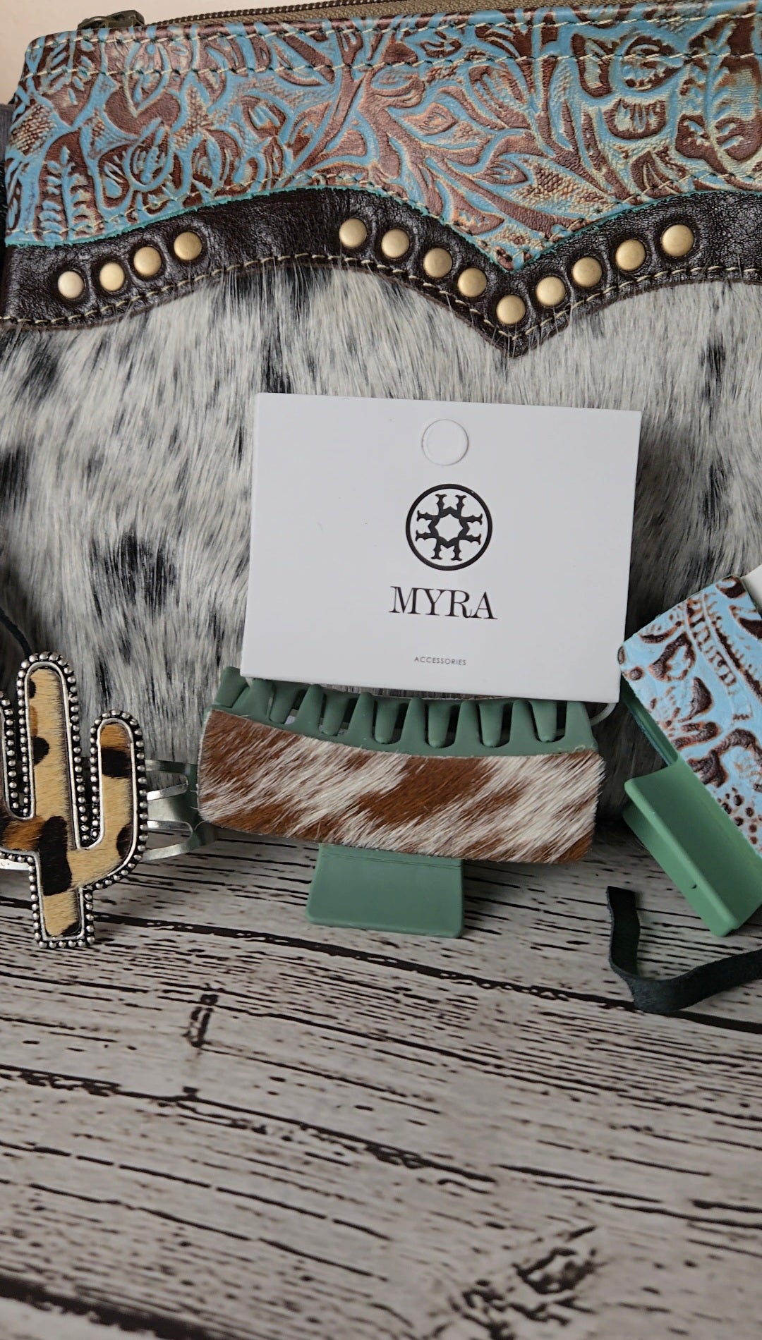 myra cowhide and tooled leather bag, cacus bracelet accessory, cow hide claw clip